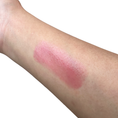 Load image into Gallery viewer, red lip balm swatch on a persons arm with a white background