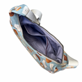 Load image into Gallery viewer, purse from the top angle showing the zipper open and the lavender lining of the bag