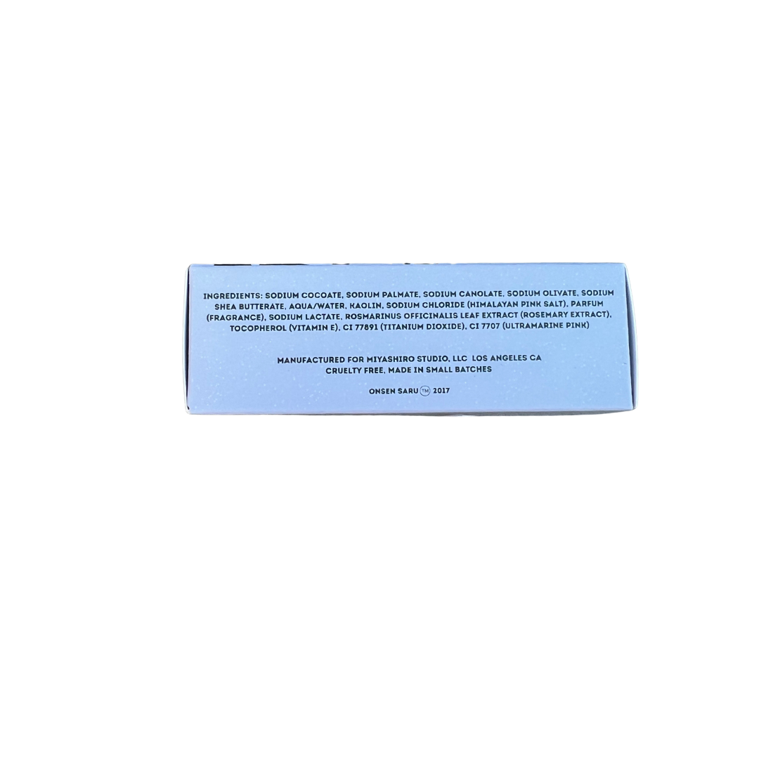 Blue rectangular bar of soap with text on a white background
