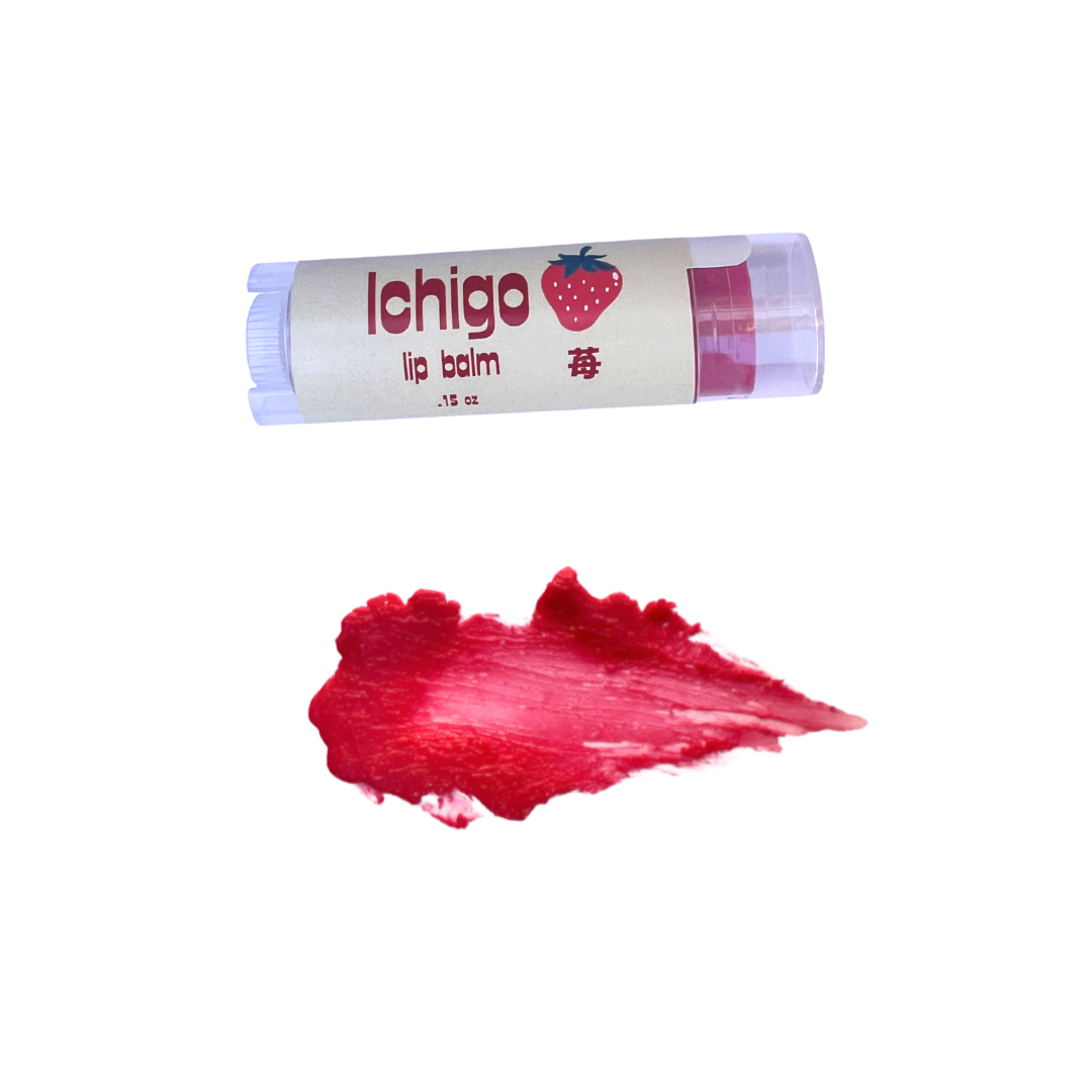 Ichigo lip balm with a red smear of lip balm on a white background