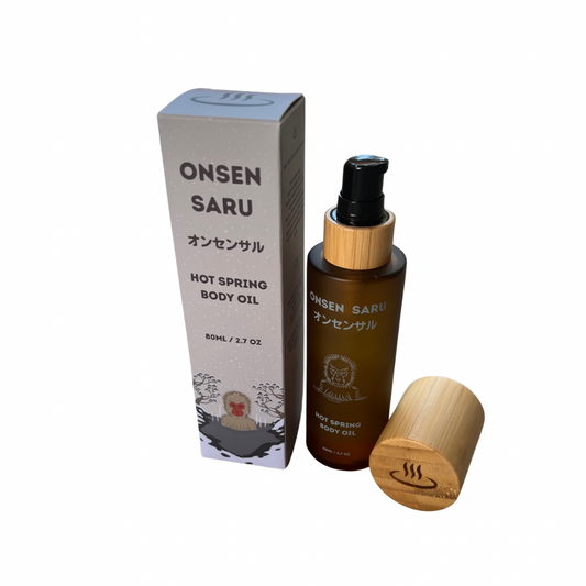 Onsen Saru hot spring body oil with packaging on a white background