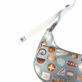 Load image into Gallery viewer, Sling bag with bread pattern on a light blue background
