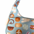 Load image into Gallery viewer, Fabric with bread pattern on a light blue background
