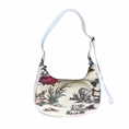 Load image into Gallery viewer, Handbag with animal print design on a white background
