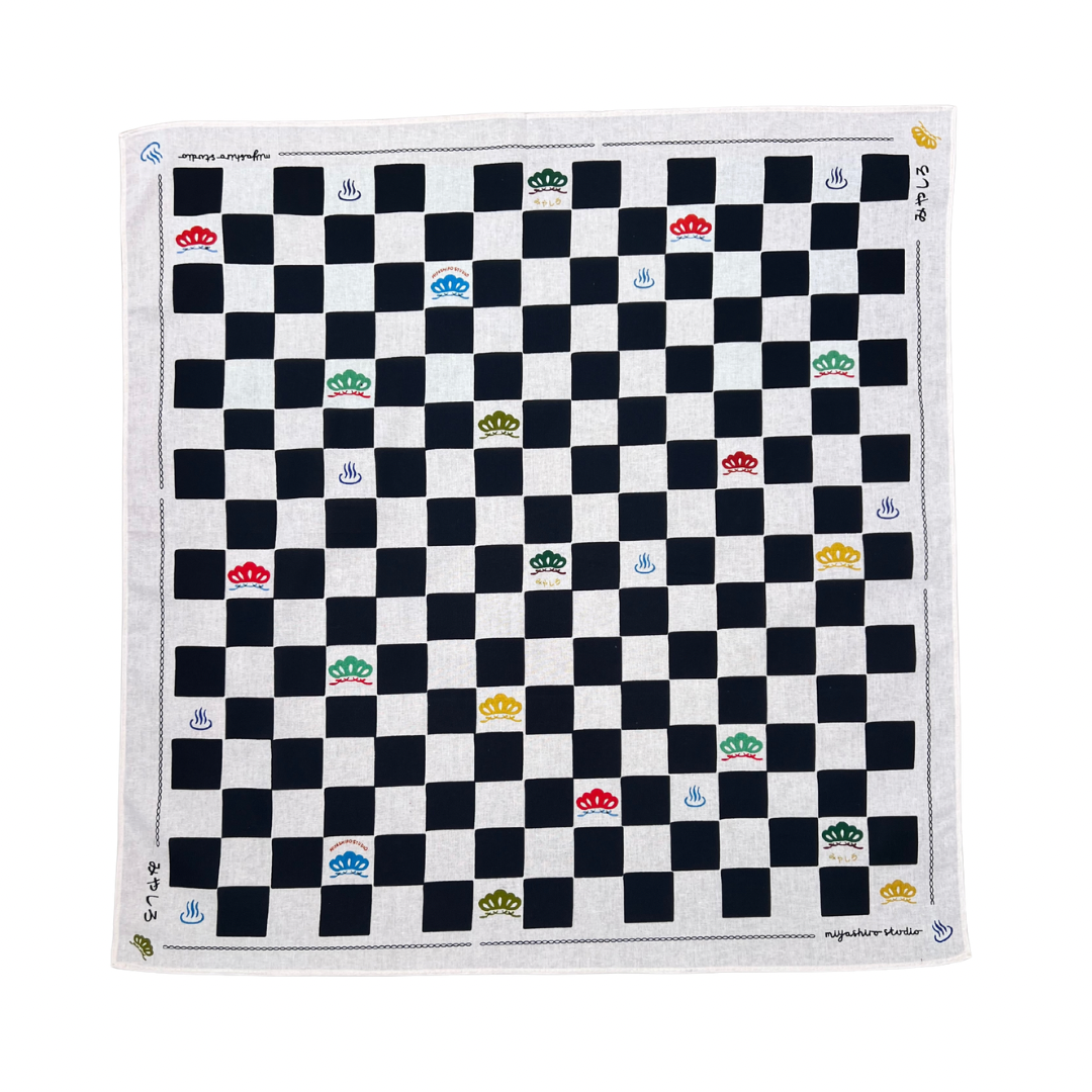 Checkered fabric with printed symbols on a white background