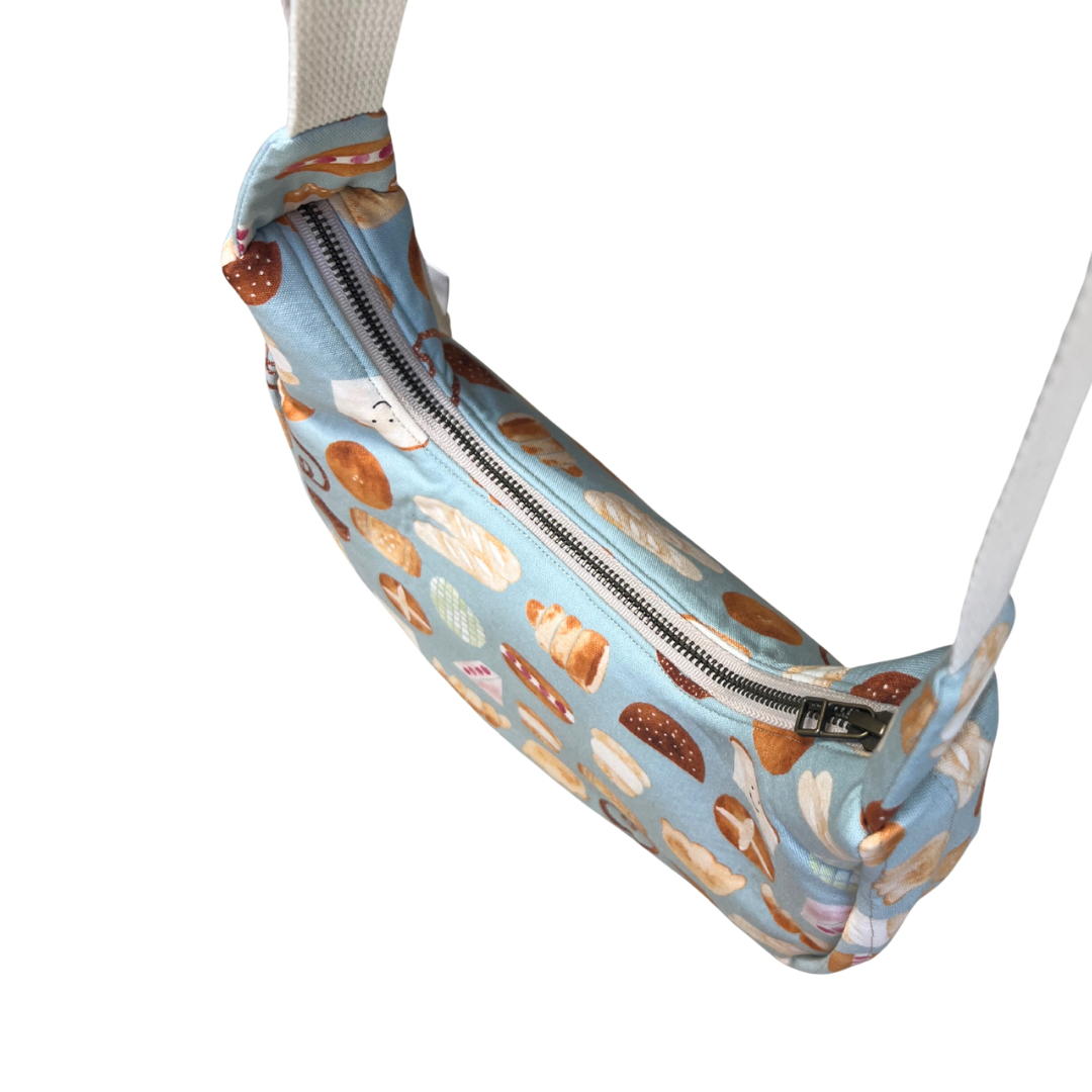 Purse with pastry pattern on a white background