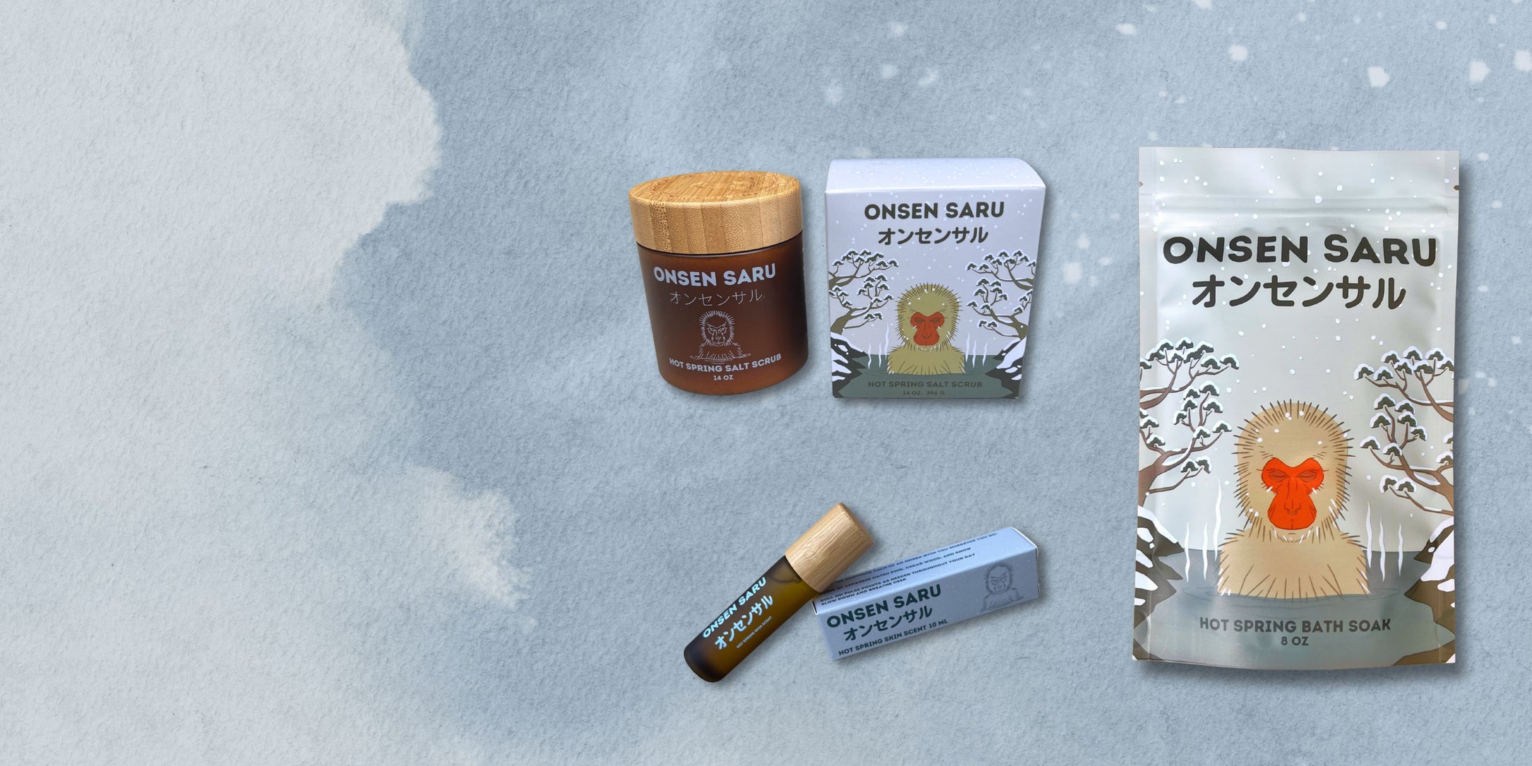 Onsen Saru skincare products on a textured gray background